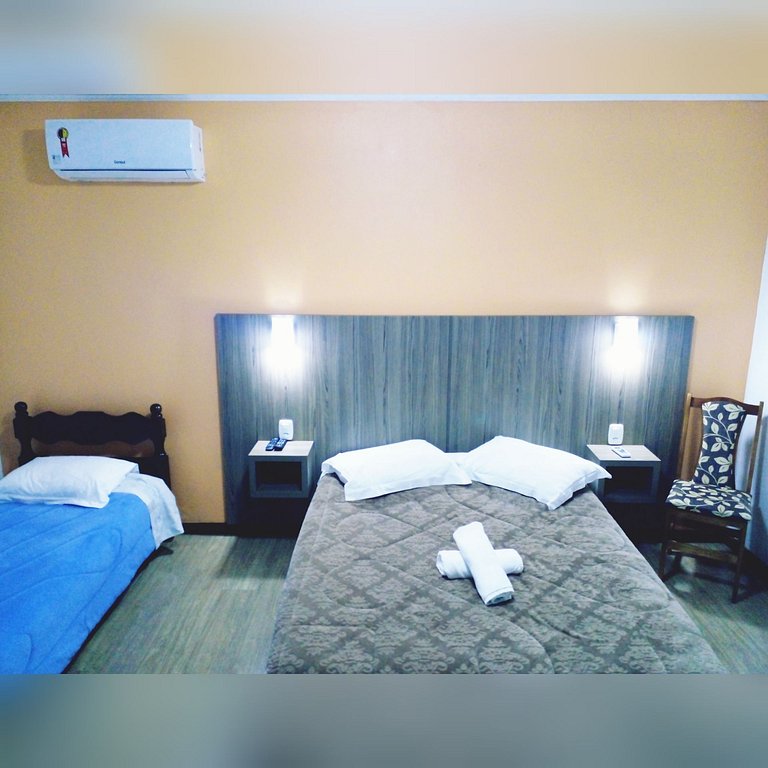 Quarto Genial Triplo Gramado