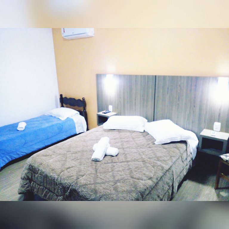 Quarto Genial Triplo Gramado